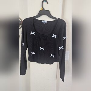 Elegant Black Top with White Accents